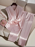 Fashionable, elegant, simple solid color sleeveless romantic date top and trousers two-piece set