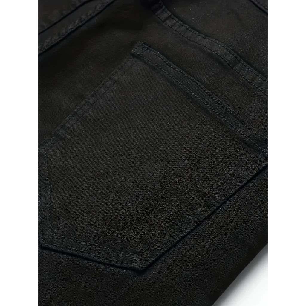 New European and American model: black, dirty, print, ripped, trendy men’s jeans.
