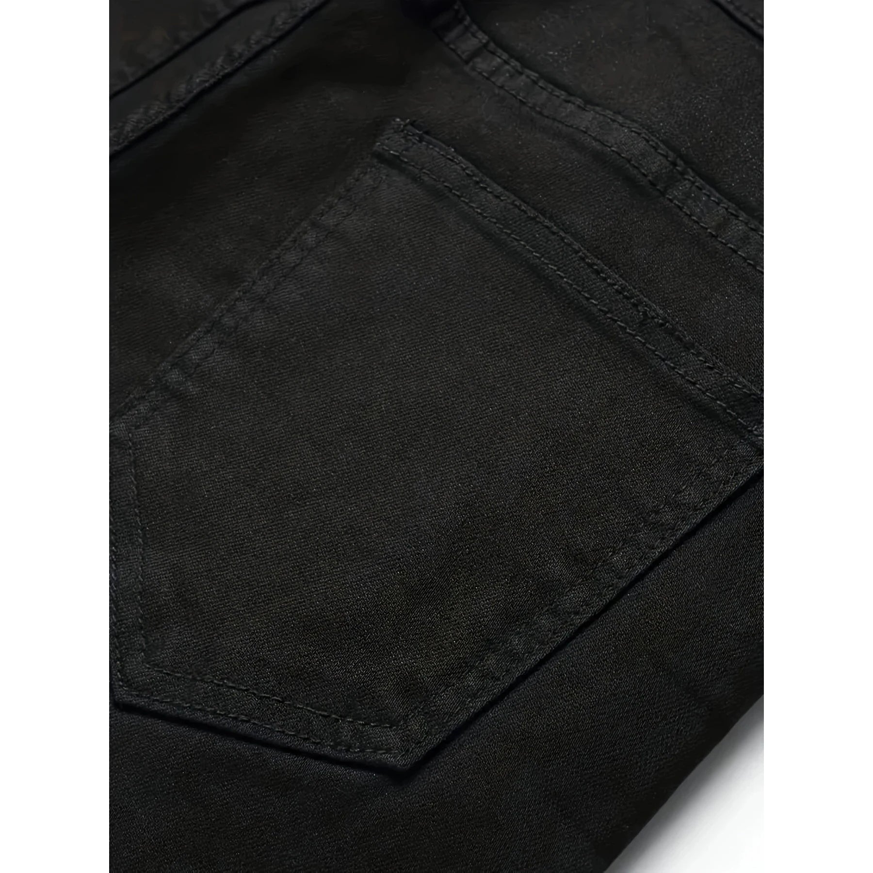 New European and American model: black, dirty, print, ripped, trendy men’s jeans.