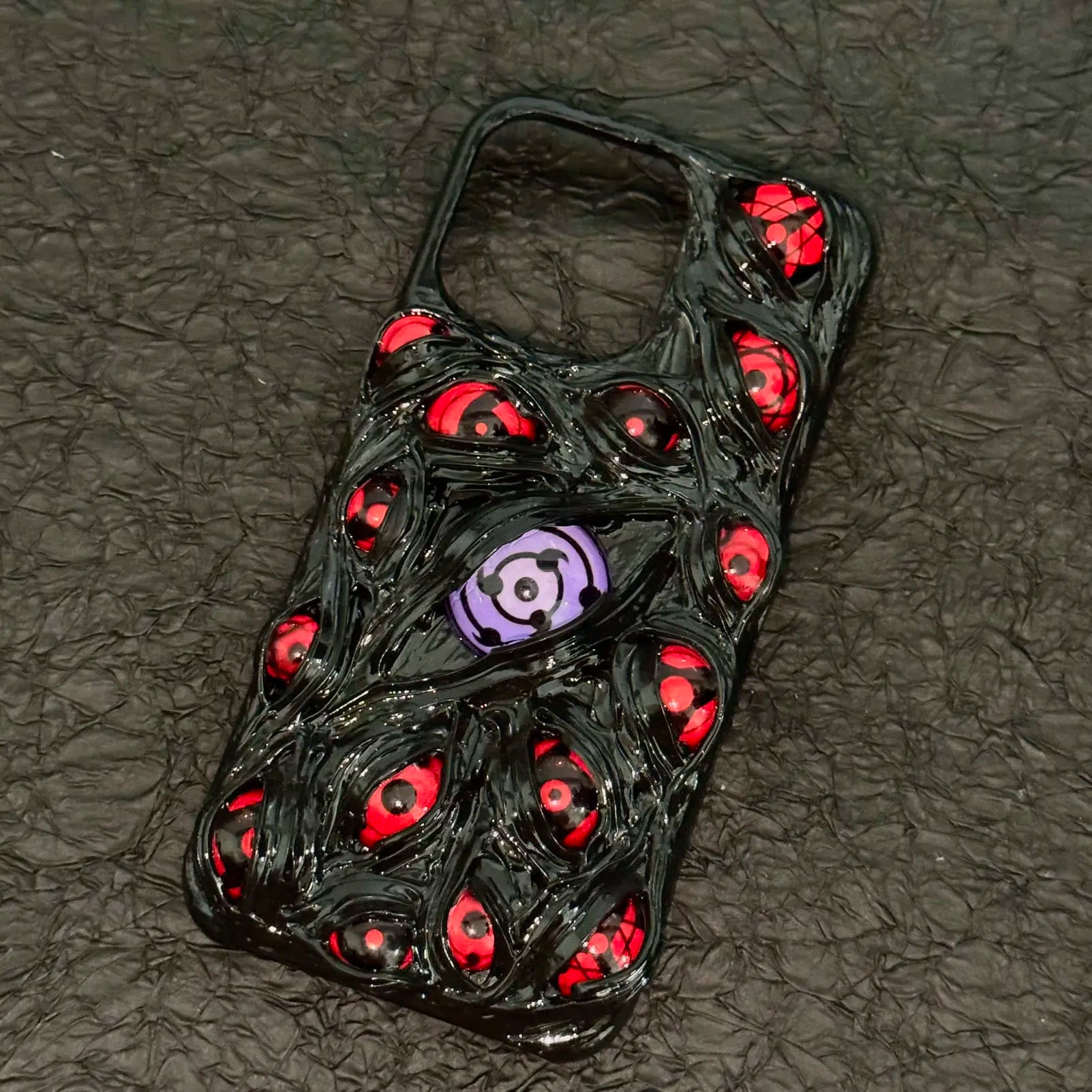 Naruto peripheral Sasuke Sharingan Itachiiiphone16proamx mobile phone case animation handmade luminous Sasuke mobile phone case