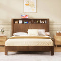 Queen-size slatted bed frame with storage, built-in charging ports, wave-shaped design, and metal support structure, Walnut