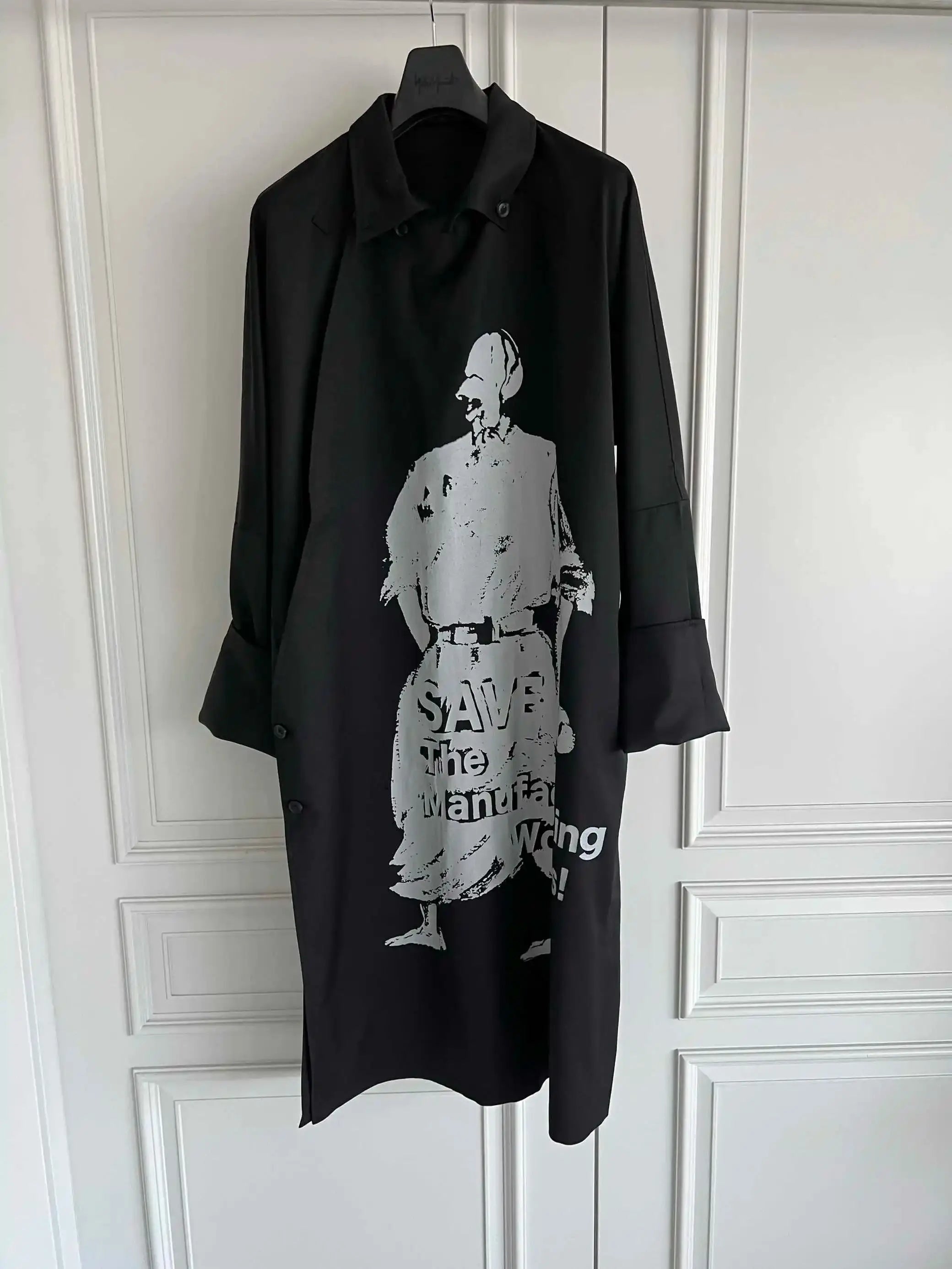 TOP-YAMAMOTO is a niche designer brand of mid-length windbreakers with original design buttons and blended coats
