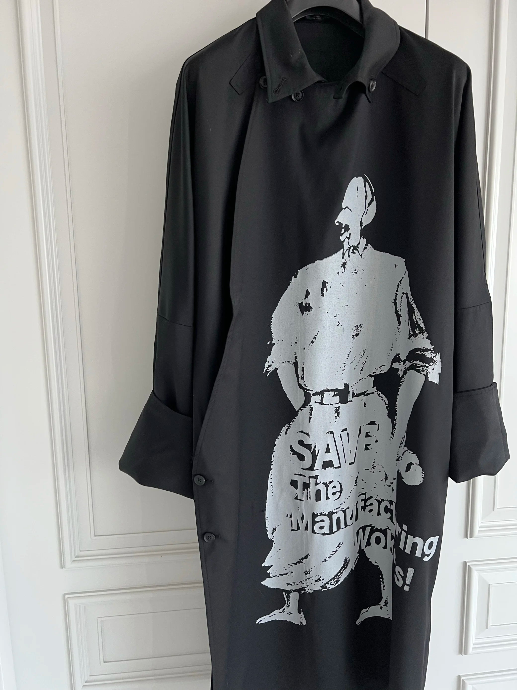 TOP-YAMAMOTO is a niche designer brand of mid-length windbreakers with original design buttons and blended coats