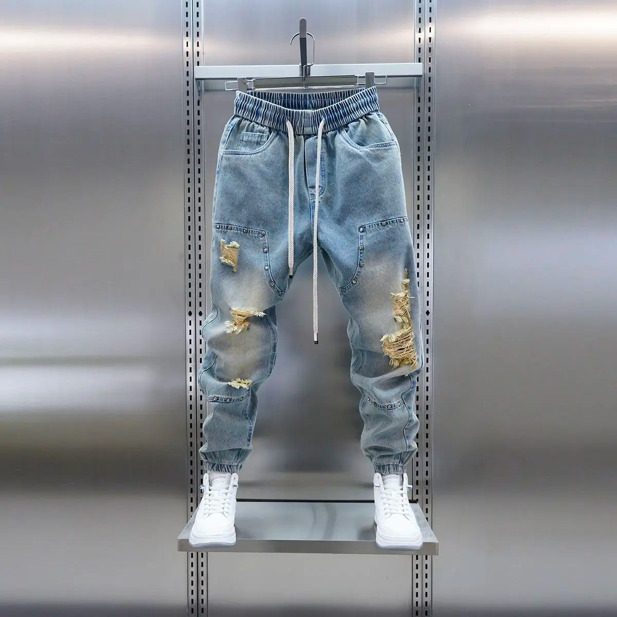 Men's distressed ripped drawstring and cuffed jeans with rivet embellishments high-street slim-fit trousers brand men clothing