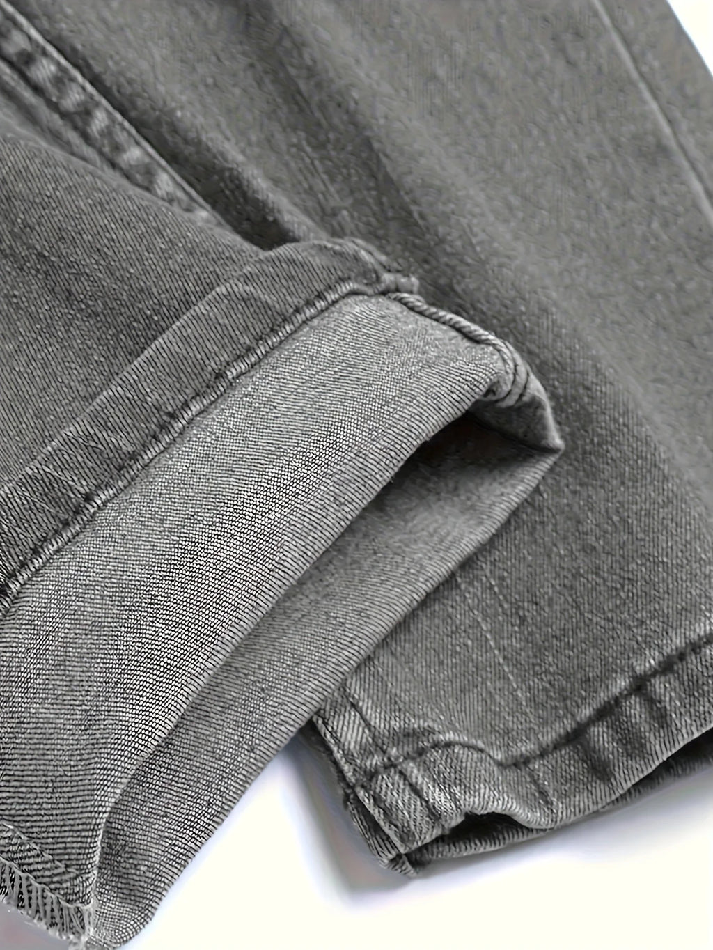 Men's gray skinny jeans with large rips, featuring a unique distressed design that fits the body shape perfectly, making it easy