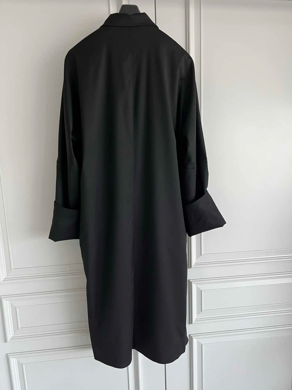 TOP-YAMAMOTO is a niche designer brand of mid-length windbreakers with original design buttons and blended coats