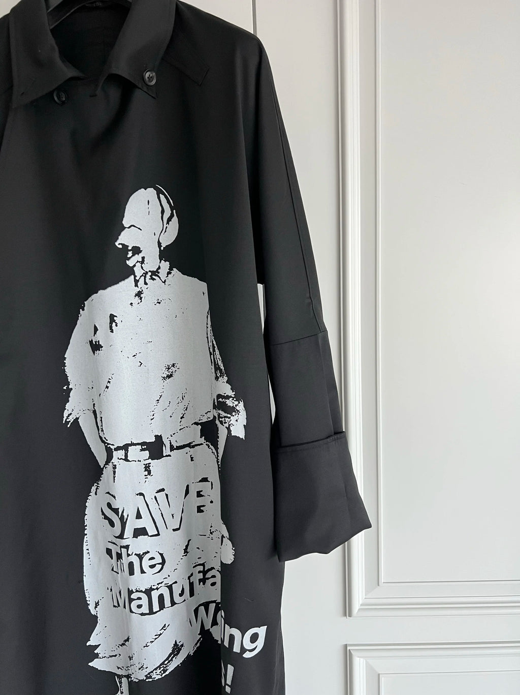 TOP-YAMAMOTO is a niche designer brand of mid-length windbreakers with original design buttons and blended coats