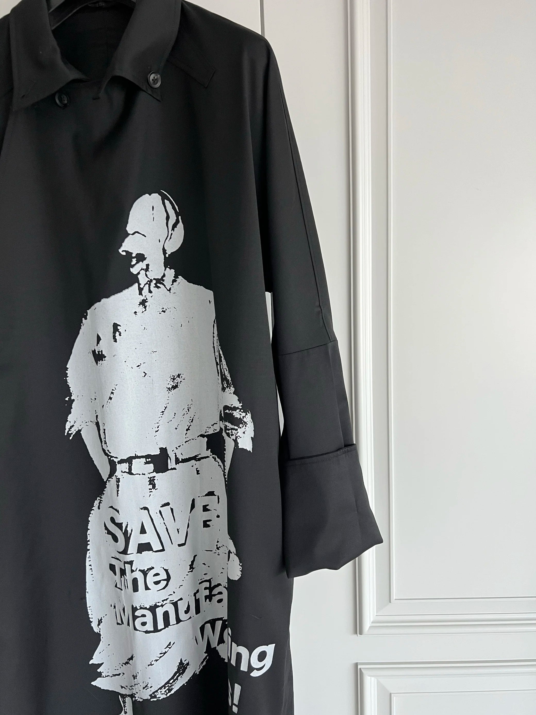 TOP-YAMAMOTO is a niche designer brand of mid-length windbreakers with original design buttons and blended coats