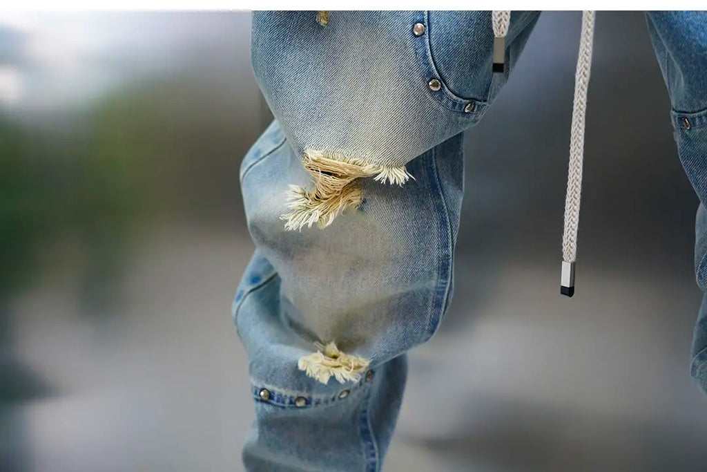 Men's distressed ripped drawstring and cuffed jeans with rivet embellishments high-street slim-fit trousers brand men clothing
