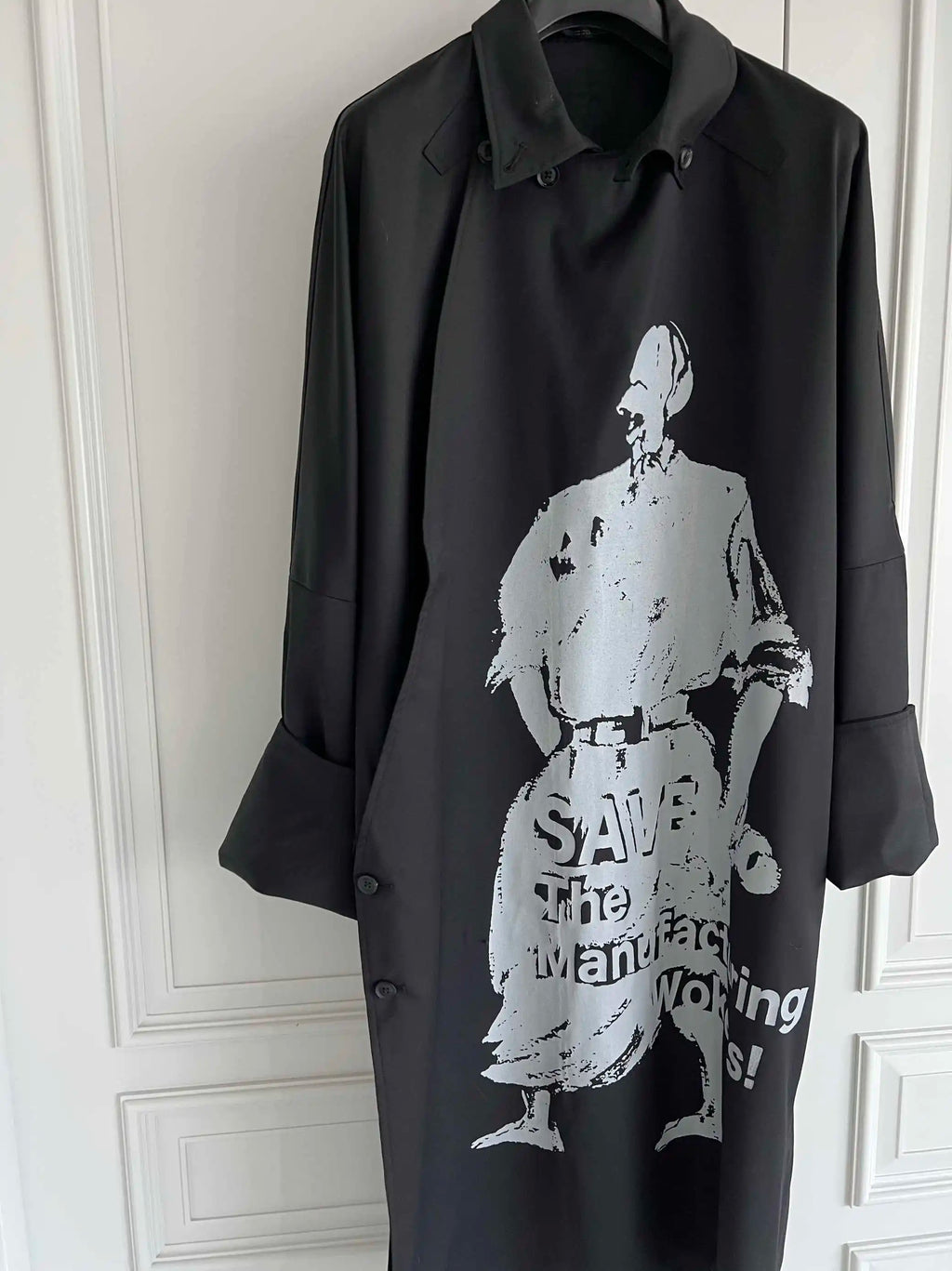 TOP-YAMAMOTO is a niche designer brand of mid-length windbreakers with original design buttons and blended coats