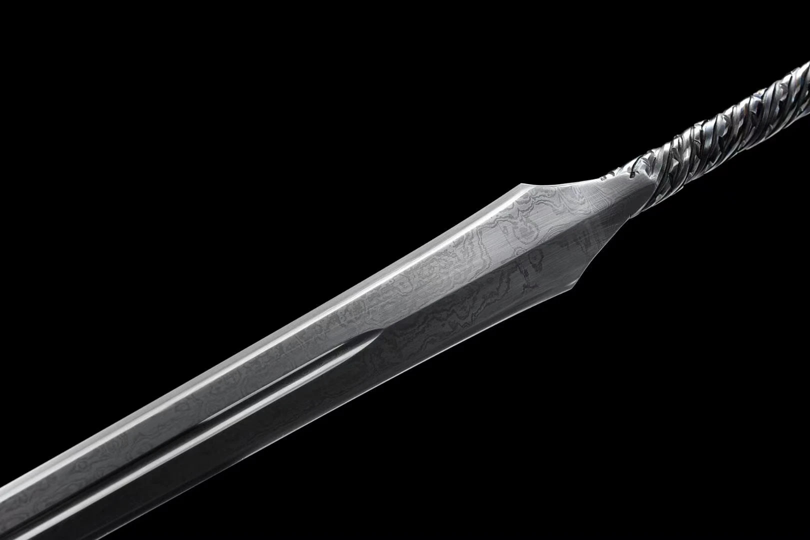 medieval Viking era samurai sword and a folded Damascus steel one-piece sword are ready for battle, handcrafted sharp weapons