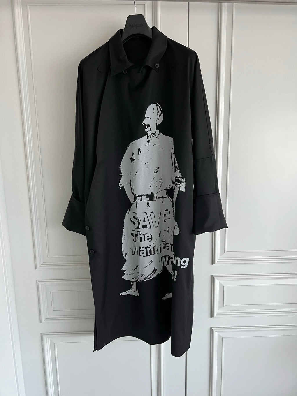 TOP-YAMAMOTO is a niche designer brand of mid-length windbreakers with original design buttons and blended coats