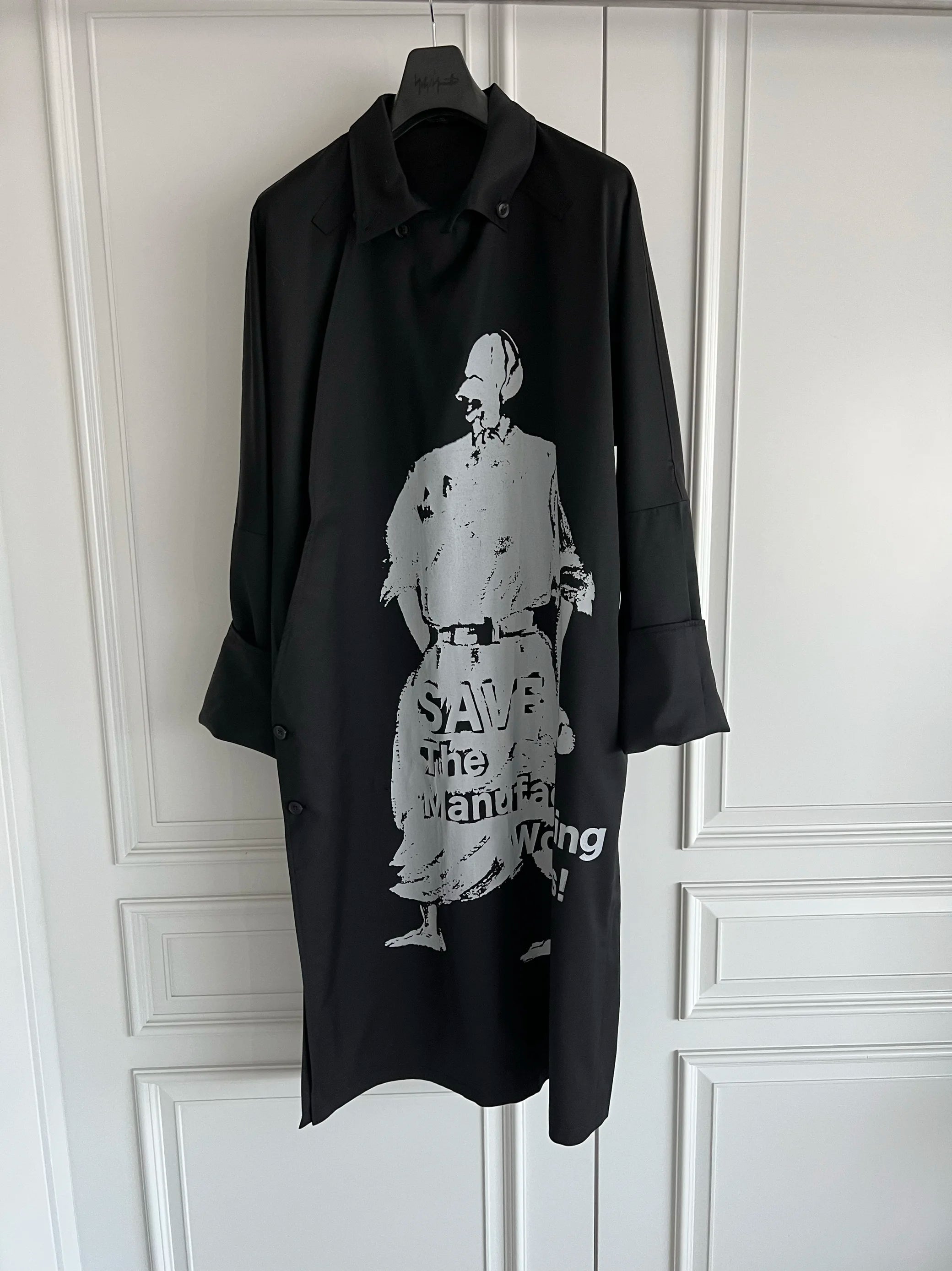 TOP-YAMAMOTO is a niche designer brand of mid-length windbreakers with original design buttons and blended coats