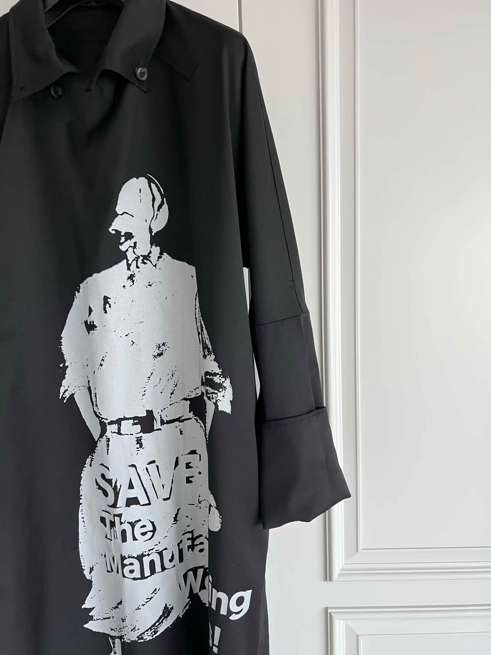 TOP-YAMAMOTO is a niche designer brand of mid-length windbreakers with original design buttons and blended coats