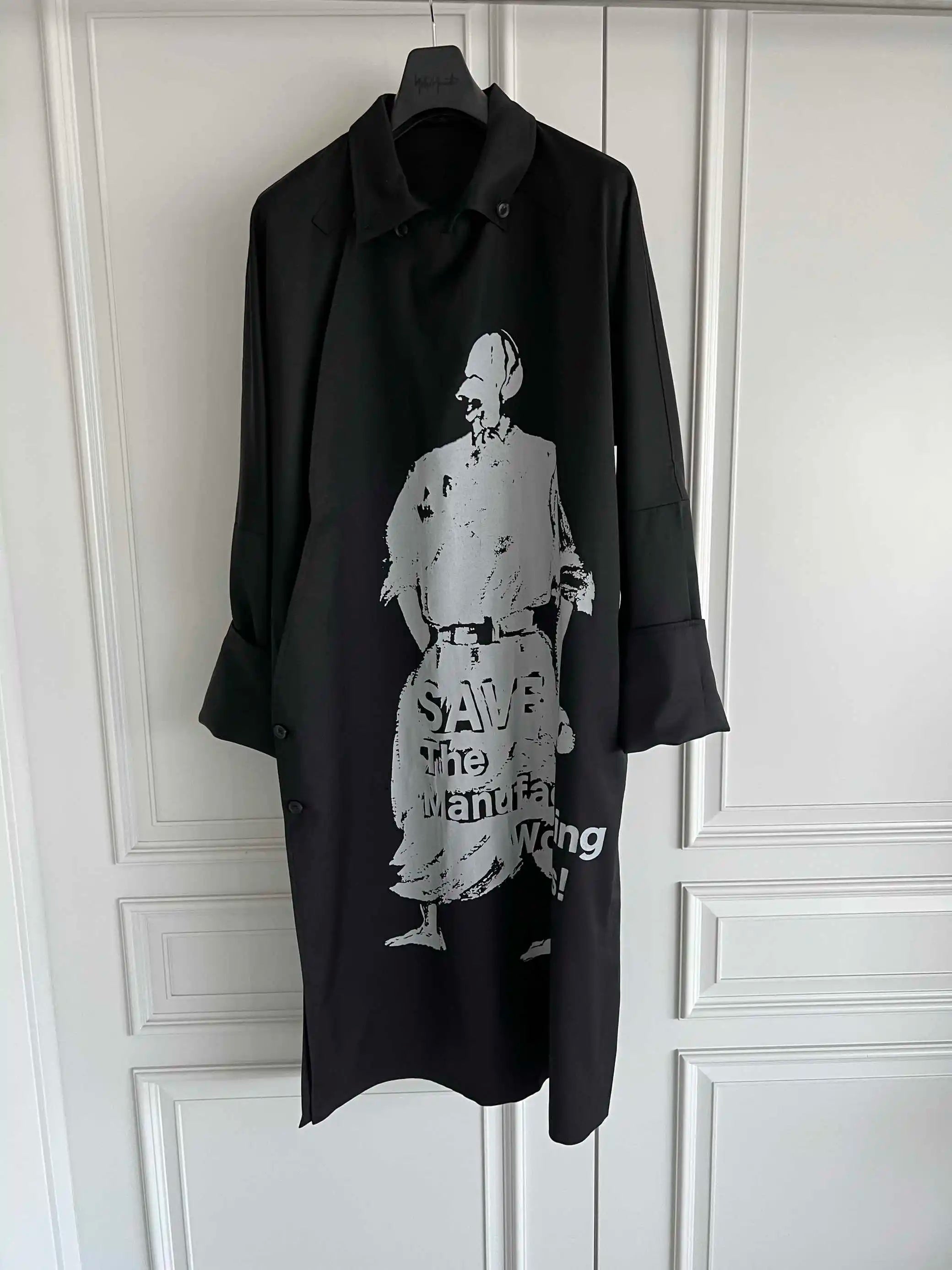 TOP-YAMAMOTO is a niche designer brand of mid-length windbreakers with original design buttons and blended coats